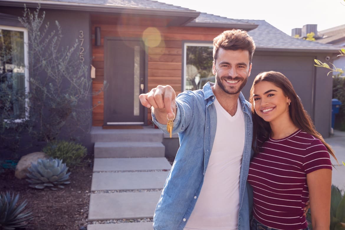Portrait Of Couple Standing Outdoors