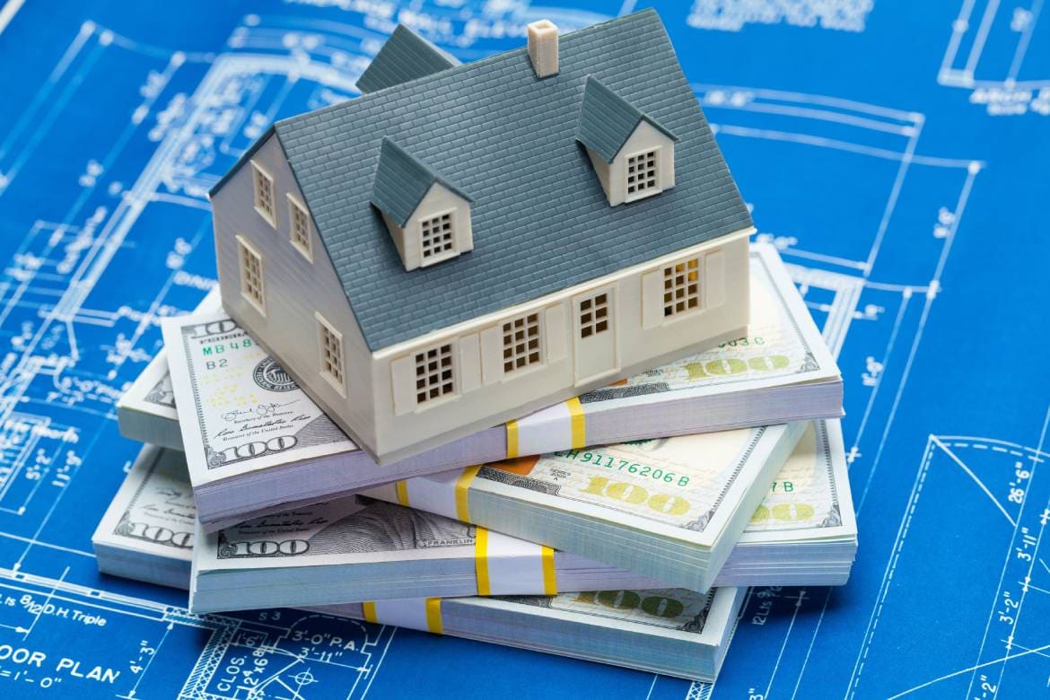 illustration of the house with along with bundled dollar bills