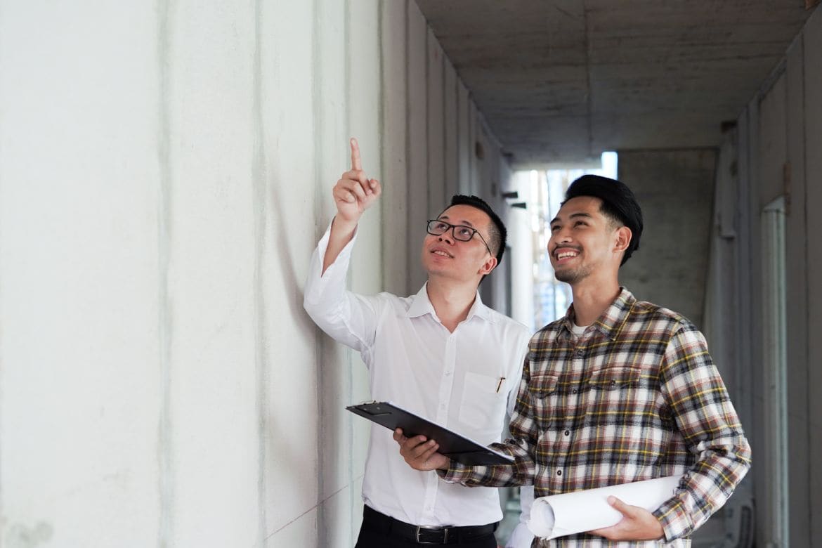 workers inspecting a house