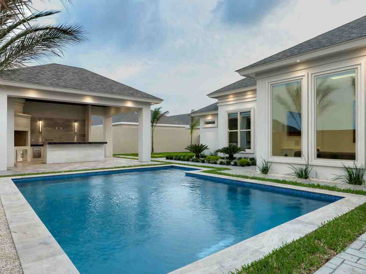 Backyard with pool, barbecue and interior windows